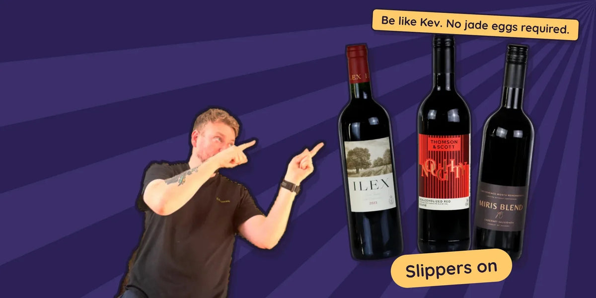 Kev pointing at three alcohol free red wines for a night in: ILEX Saint-Émilion, Noughty Rouge and Miris Blend Cabernet Sauvignon